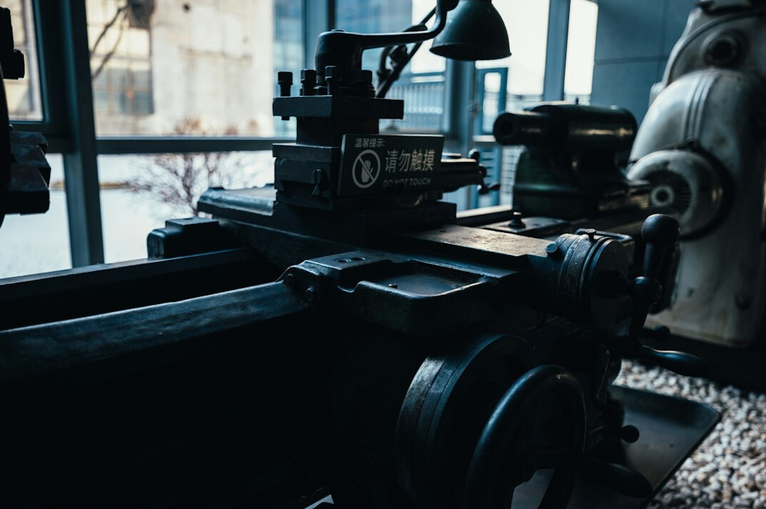 Group of trainees learning at a broadcast equipment workshop table