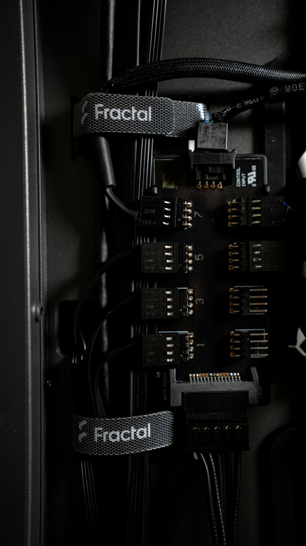Server rack with network cables and glowing status lights in a data centre
